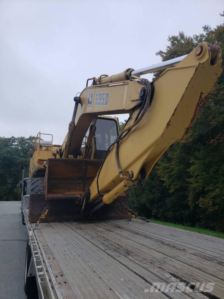 John Deere 595D Gumikerekes kotrók