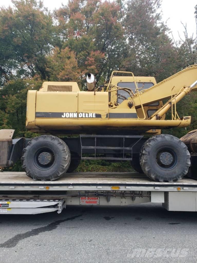 John Deere 595D Gumikerekes kotrók