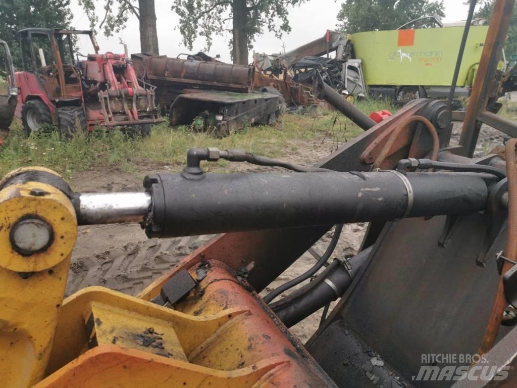 CAT 908H 2011r Gumikerekes homlokrakodók