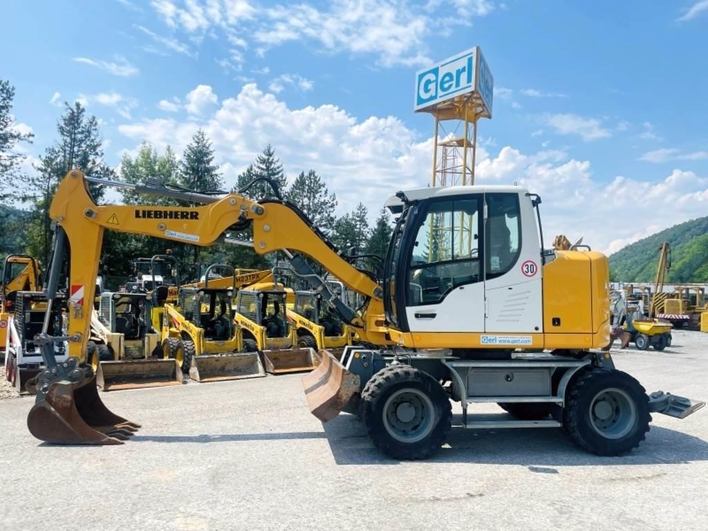 Liebherr A910 Compact Gumikerekes kotrók