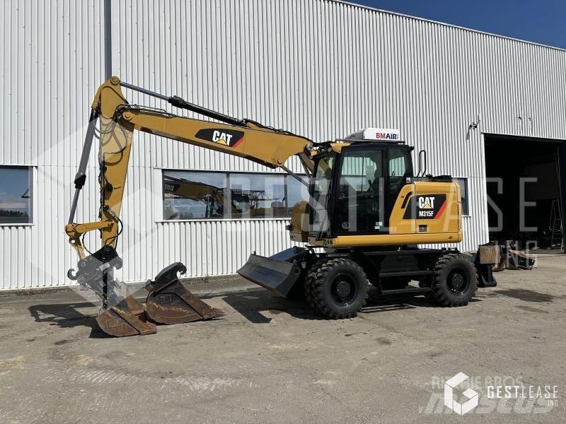 CAT M315F Gumikerekes kotrók