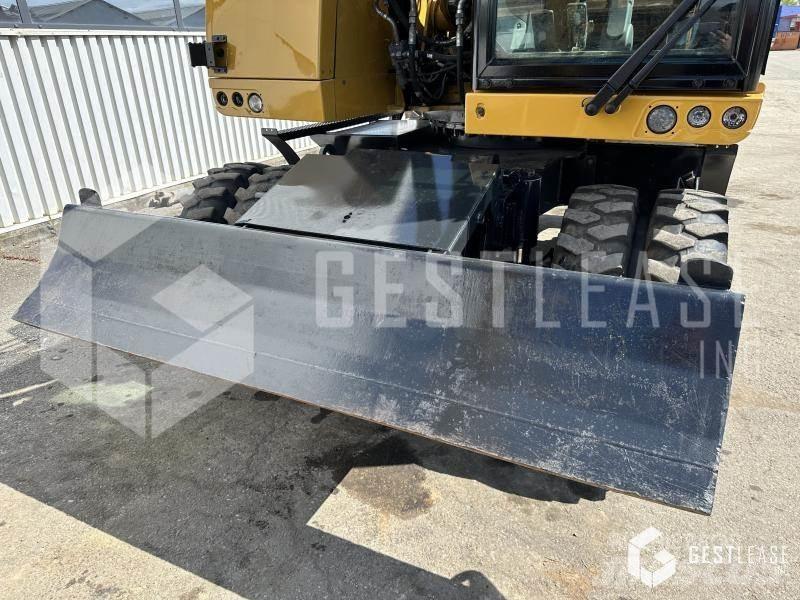 CAT M315F Gumikerekes kotrók
