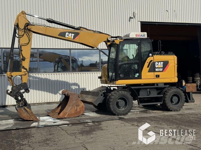 CAT M315F Gumikerekes kotrók
