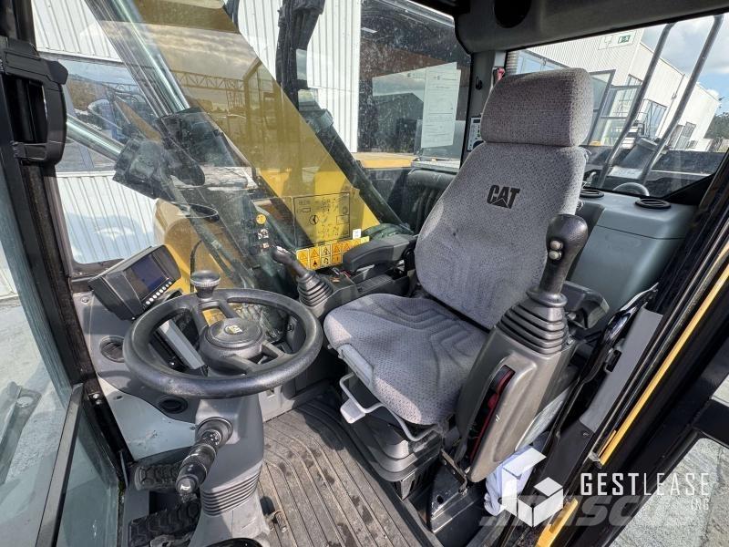 CAT M315F Gumikerekes kotrók