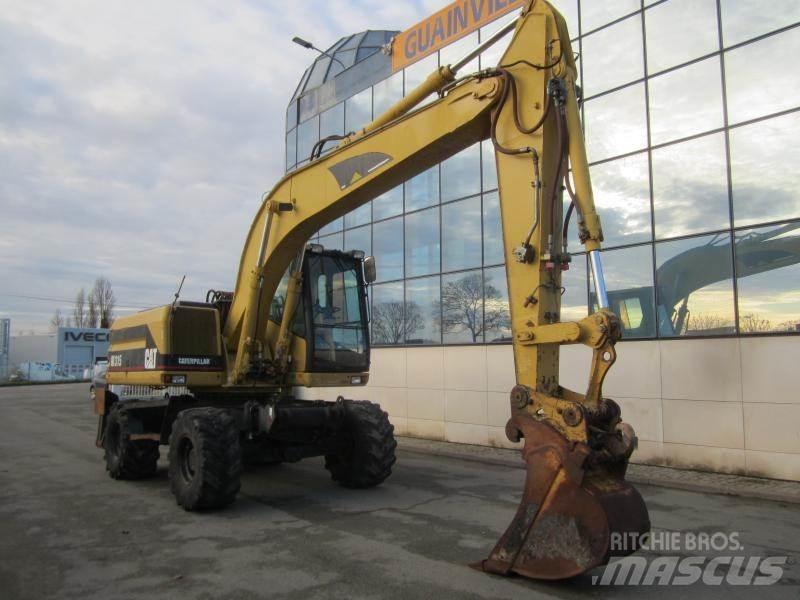 CAT M315 Gumikerekes kotrók