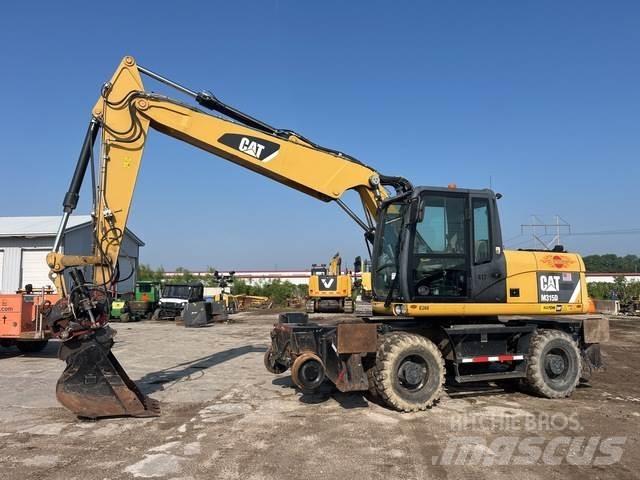 CAT M315D Gumikerekes kotrók