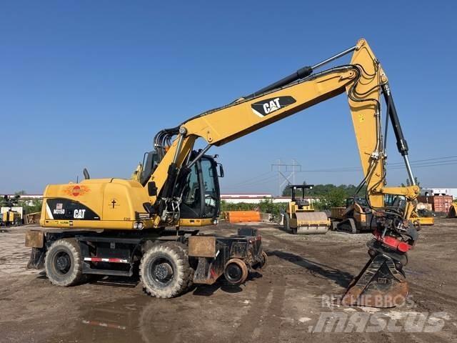 CAT M315D Gumikerekes kotrók