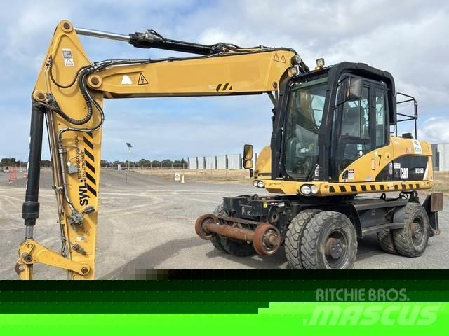 CAT M316D Gumikerekes kotrók
