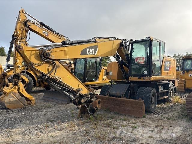CAT M318F Gumikerekes kotrók