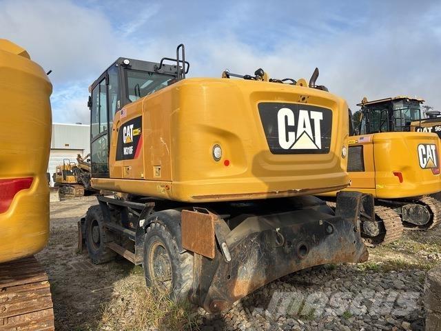 CAT M318F Gumikerekes kotrók