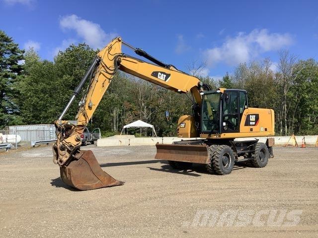 CAT M320F Gumikerekes kotrók