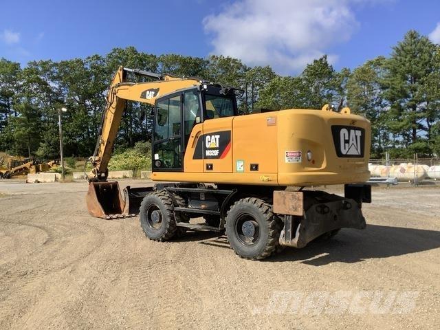 CAT M320F Gumikerekes kotrók