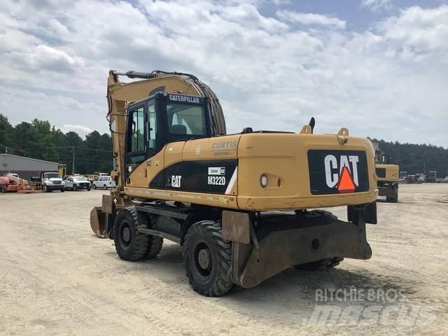 CAT M322D Gumikerekes kotrók