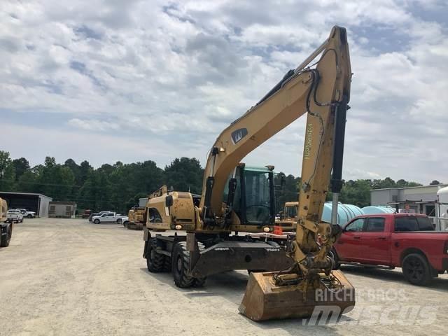 CAT M322D Gumikerekes kotrók