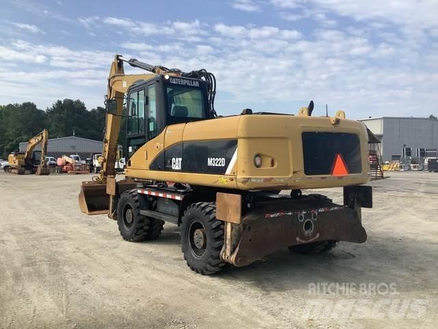 CAT M322D Gumikerekes kotrók