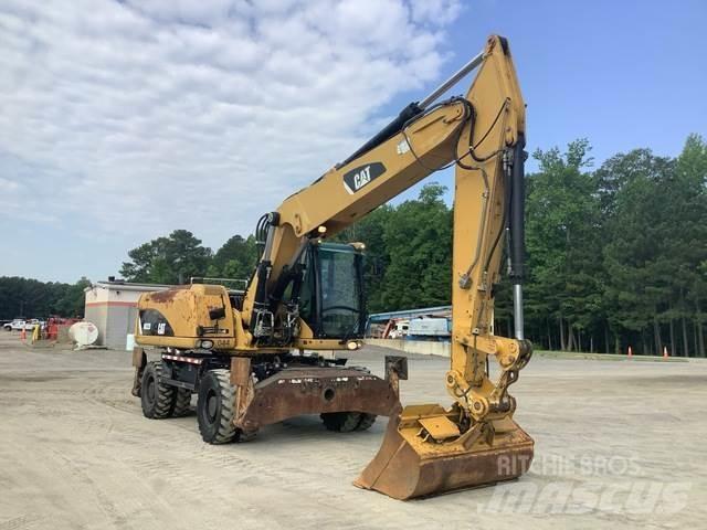 CAT M322D Gumikerekes kotrók