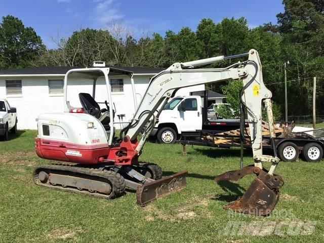 Takeuchi TB240 Lánctalpas kotrók