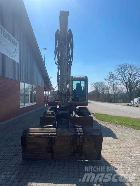 Takeuchi 1140 Mini kotrók < 7t