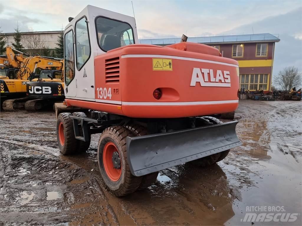 Atlas 1304 Gumikerekes kotrók