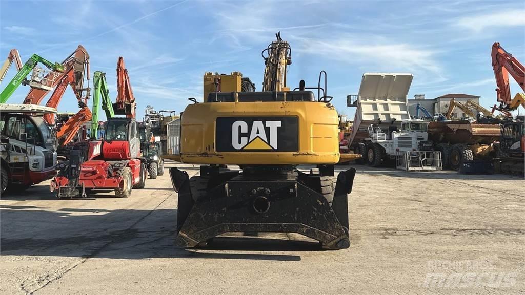 CAT M325D 4X4 Gumikerekes kotrók