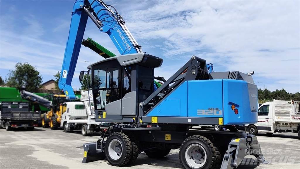 Fuchs MHL 320 Gumikerekes kotrók