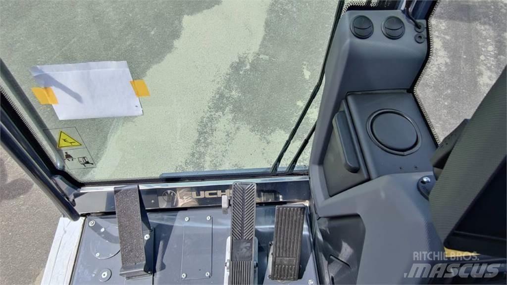 Fuchs MHL 320 Gumikerekes kotrók