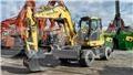 Komatsu PW118MR-11 Gumikerekes kotrók