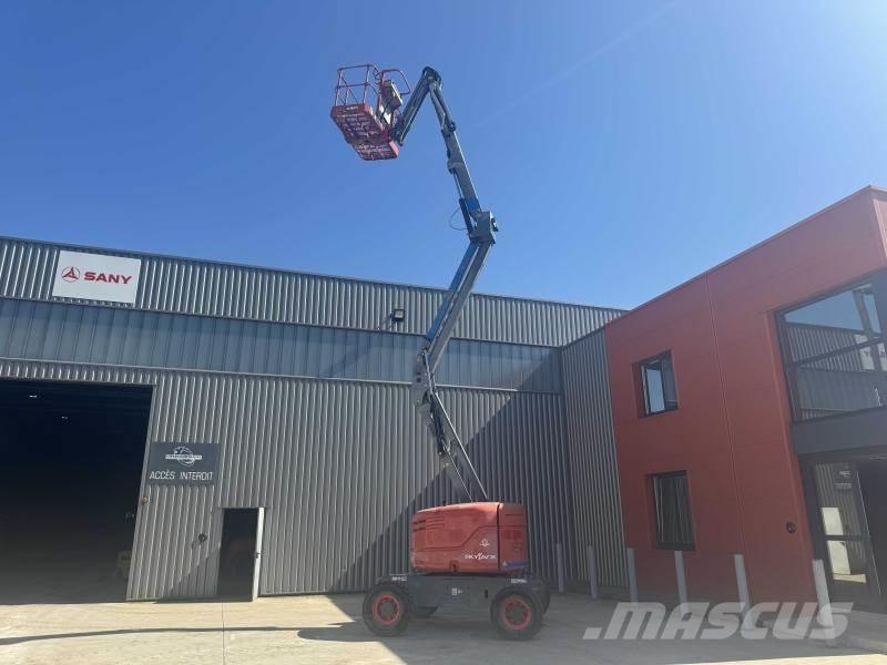 SkyJack SJ46AJ Karos emelők