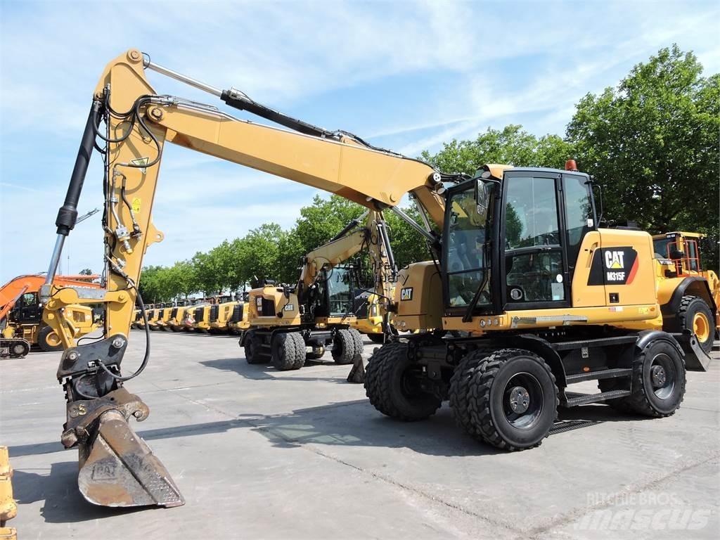 CAT M315F Gumikerekes kotrók