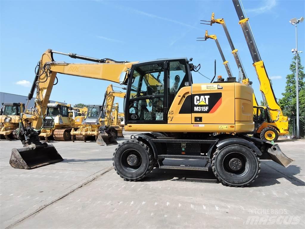 CAT M315F Gumikerekes kotrók