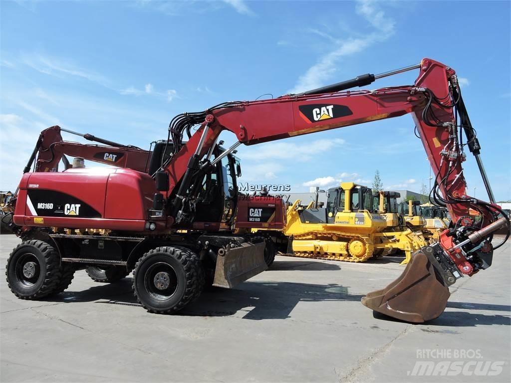 CAT M316D Gumikerekes kotrók