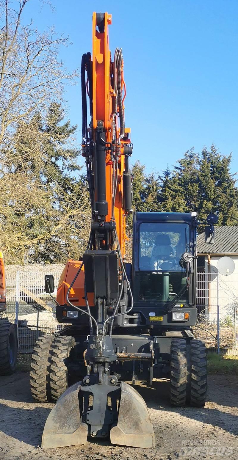Develon DX 100 W-7 Gumikerekes kotrók