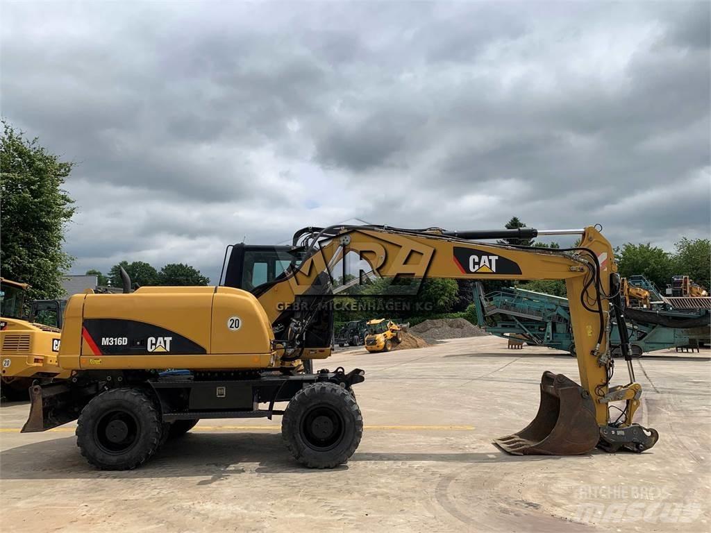 CAT M 316D Gumikerekes kotrók