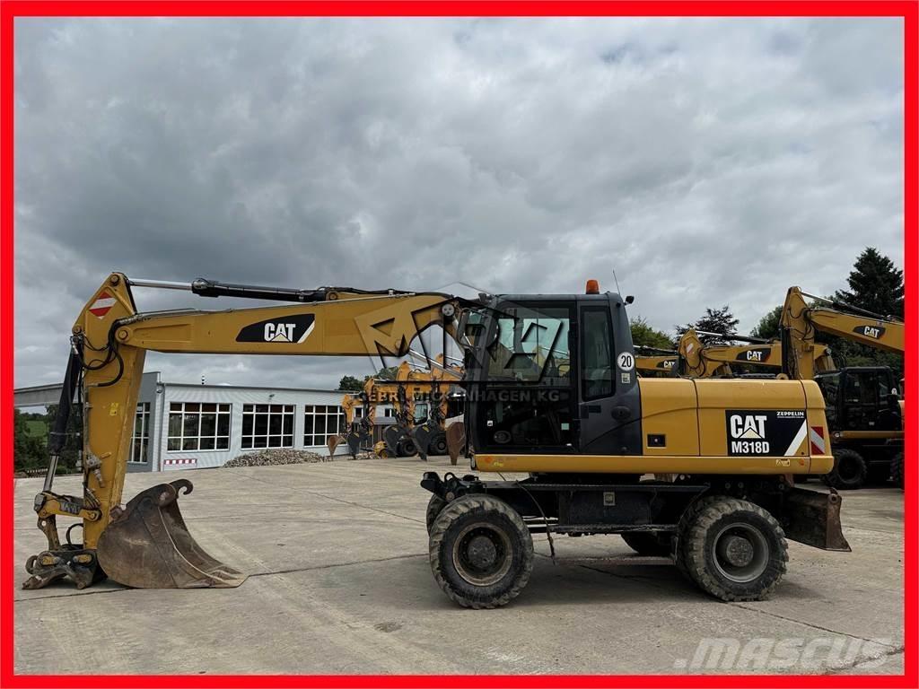 CAT M 318 D Gumikerekes kotrók
