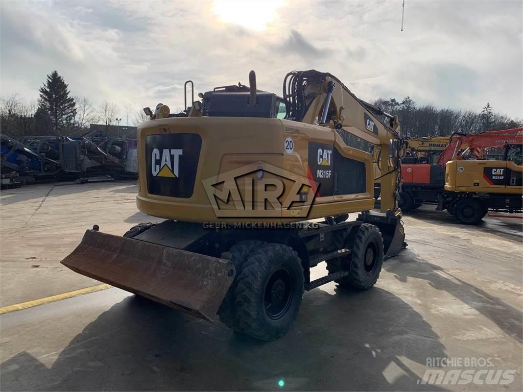 CAT M315 F Gumikerekes kotrók