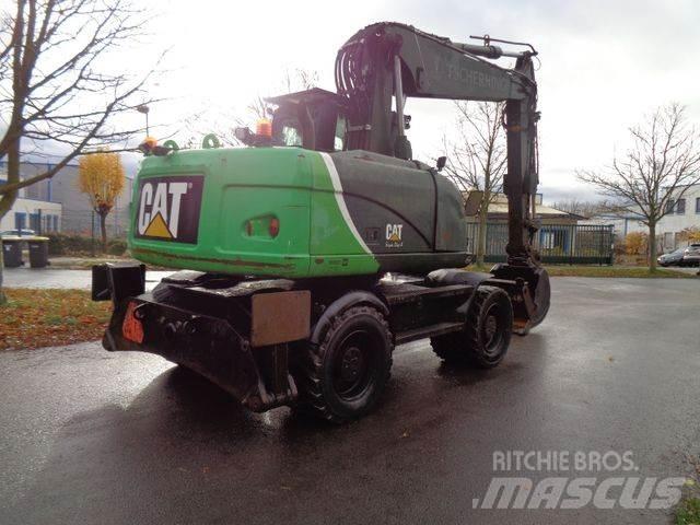 CAT M315 D Gumikerekes kotrók