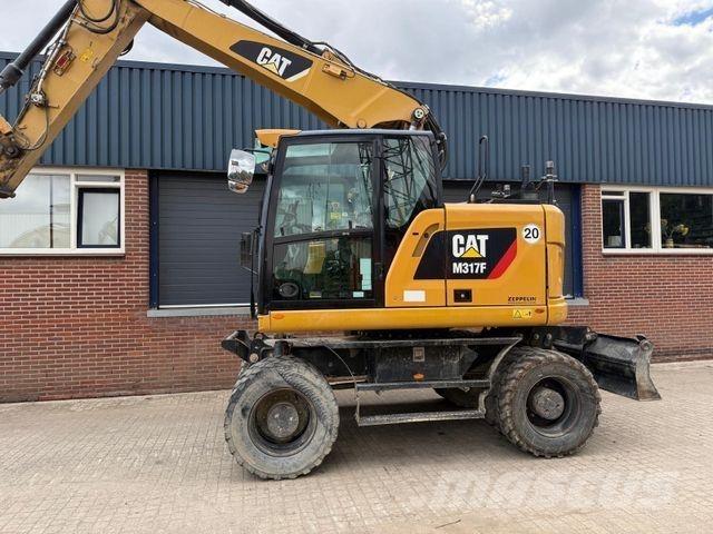 CAT M317 F Gumikerekes kotrók