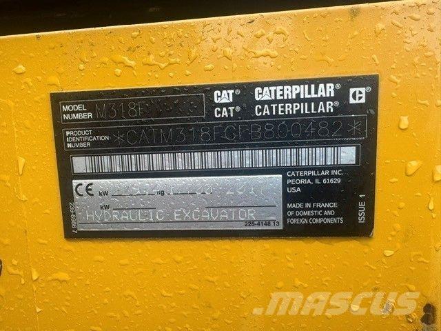 CAT M318F Gumikerekes kotrók