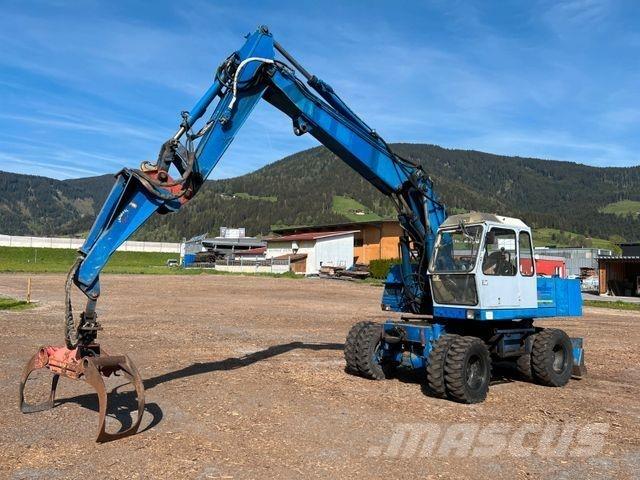 Fuchs 713 Gumikerekes kotrók