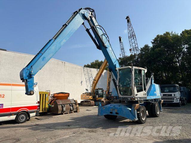 Fuchs MHL 320 Gumikerekes kotrók