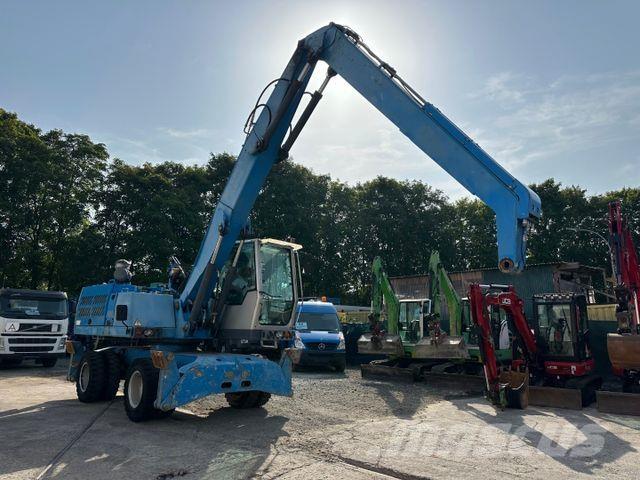 Fuchs MHL 320 Gumikerekes kotrók