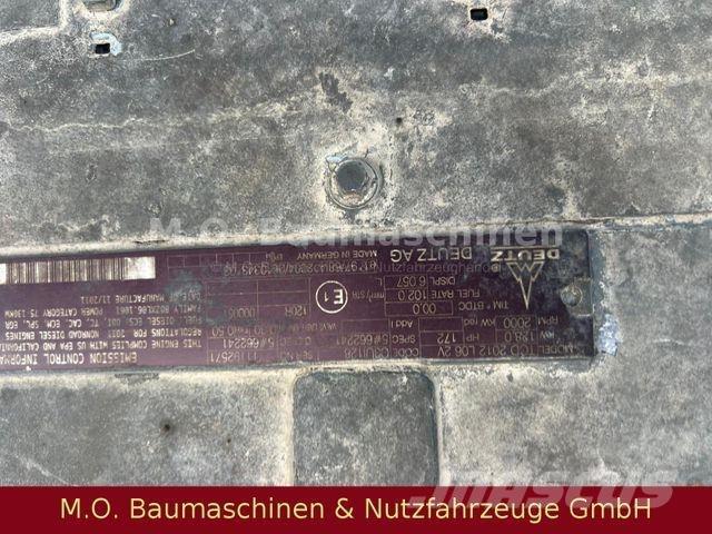 Fuchs MHL 340 Gumikerekes kotrók