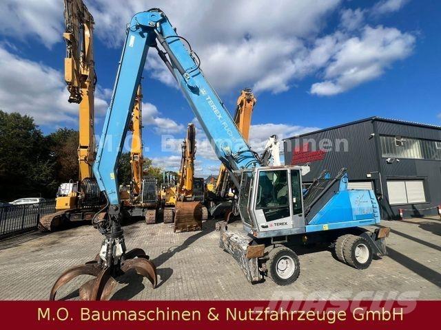 Fuchs MHL 340 Gumikerekes kotrók