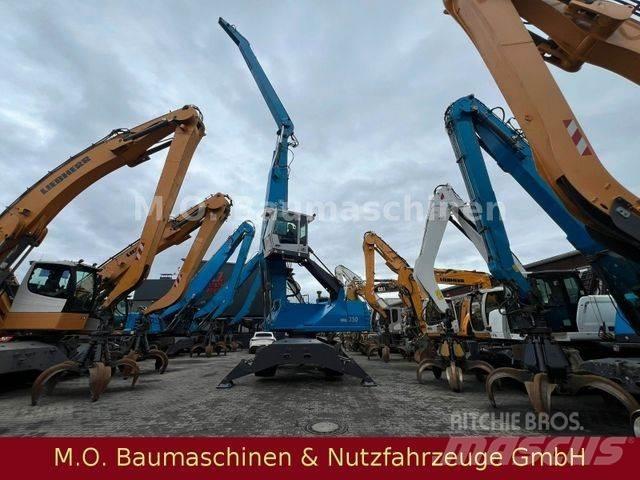 Fuchs MHL 350 Gumikerekes kotrók