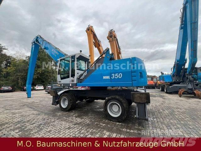 Fuchs MHL 350 Gumikerekes kotrók