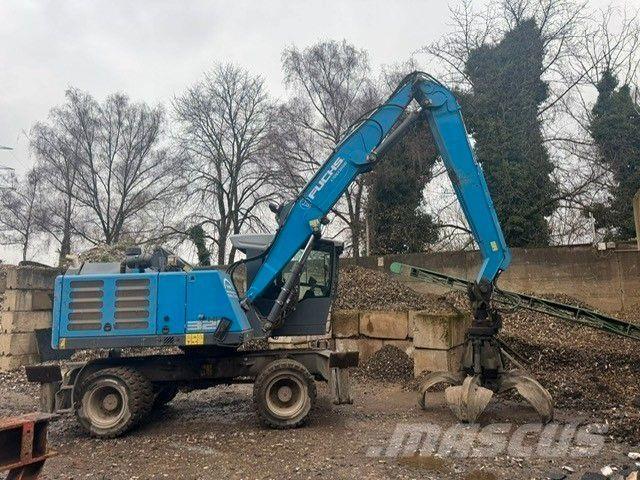 Fuchs MHL320 T4f Gumikerekes kotrók