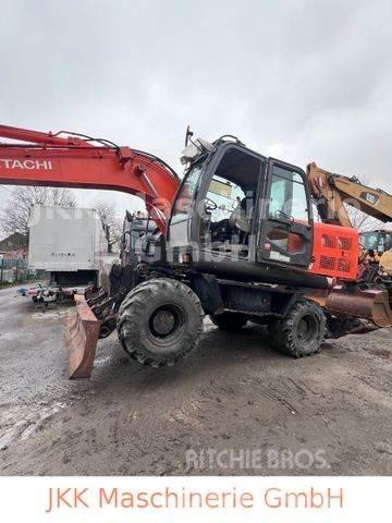 Hitachi ZX 140 W - 3 Gumikerekes kotrók