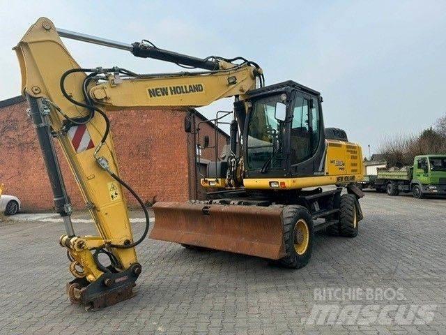 New Holland WE210 Gumikerekes kotrók
