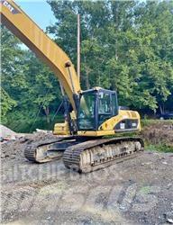 CAT 324DL Hosszú gém kotrók