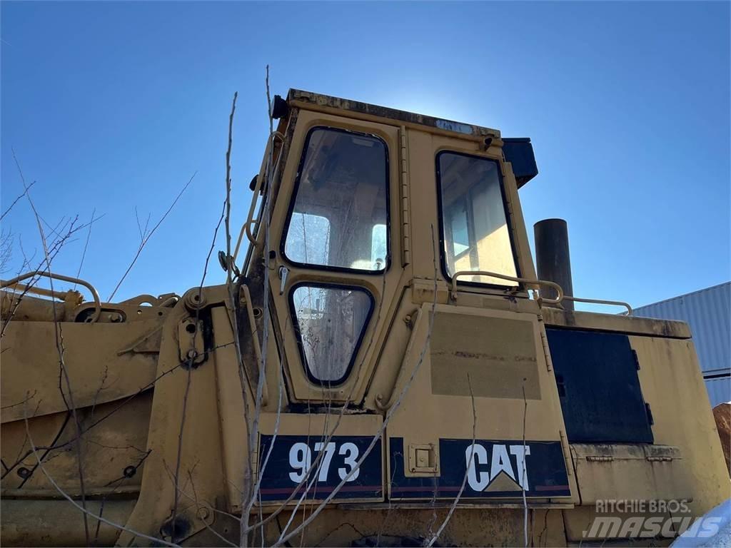 CAT 973 Lánctalpas homlokrakodók